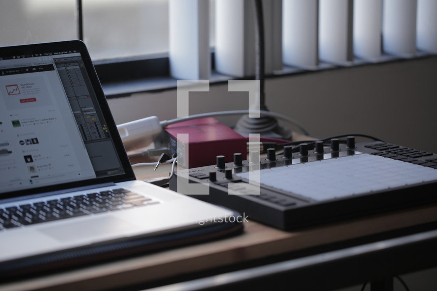laptop and sound production equipment 