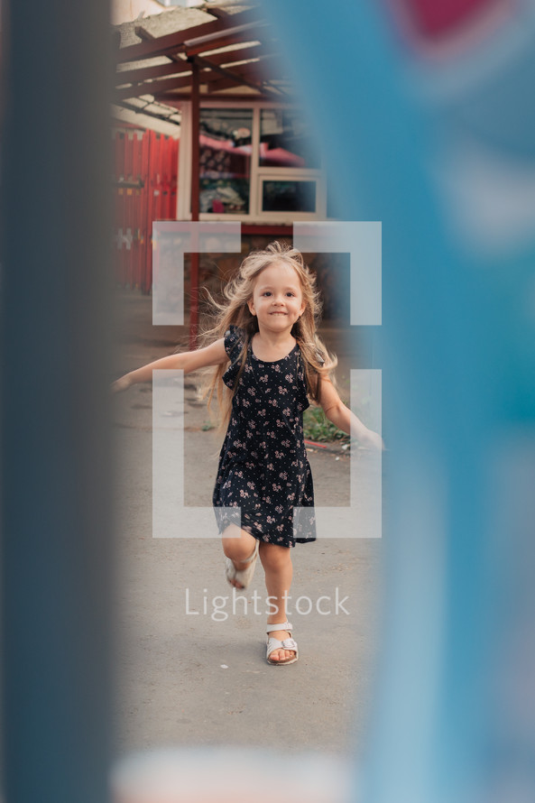 little girl running 