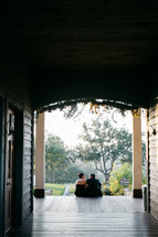 couple sitting on a southern porch 
