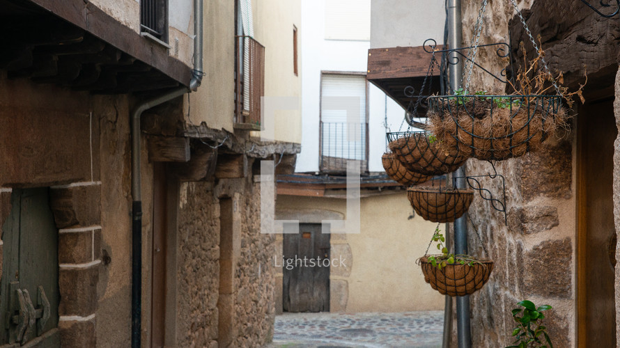 flowerpot made with coconut on street of San Martin de Trevejo,