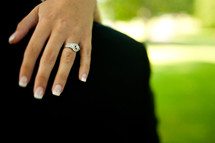 engagement ring on a hand