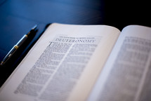 Bible opened to Deuteronomy