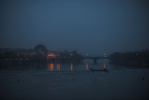 a foggy shore at night 