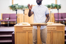 man preaching from the pulpit 
