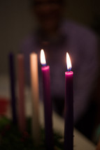 flames on a candle on an Advent wreath 