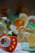 a bunch of pacifiers. 
