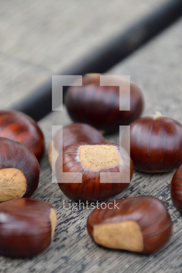 chestnuts on wooden planks