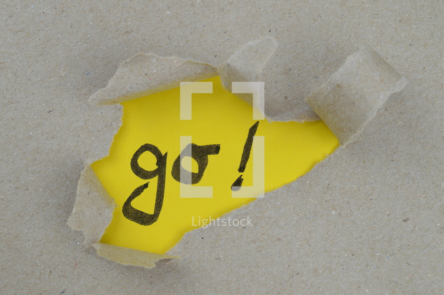 ripped open paper with the word GO!