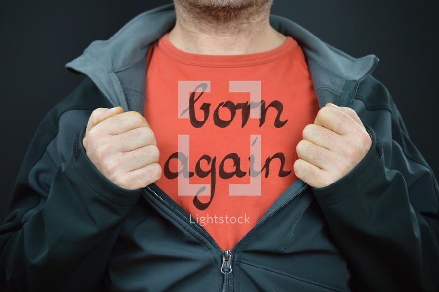 a man with the words born again on his red t-shirt 