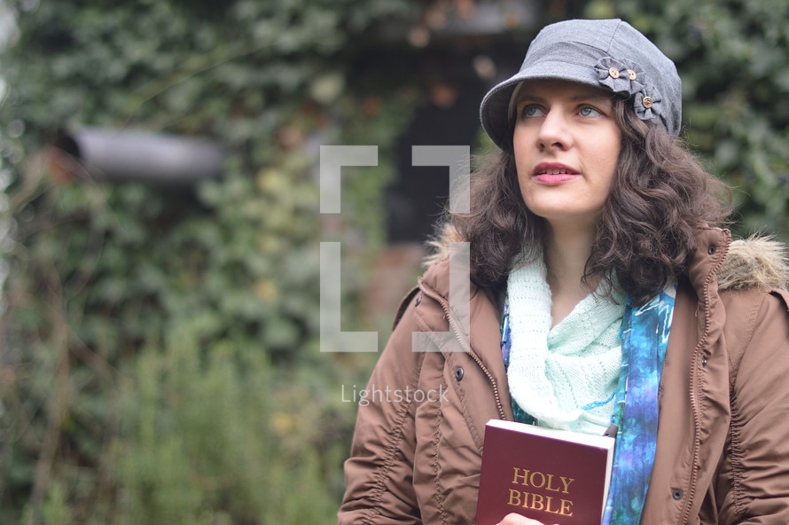 woman holding a bible and thinking about God and his word. 
woman, hold, holding, think, thinking, bible, scripture, word, holy book, book, study, studying, god's word, daily, bible study, open, everyday, focus, learn, learning, quiet time, time, quiet, hear, hearing, listen, listening, attentive, interested, intense, considerate, thoughtful, thought, observant, close, learn, learning, female, outdoor, joy, happy, delight, rejoice