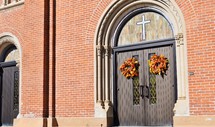 fall wreaths on church doors 