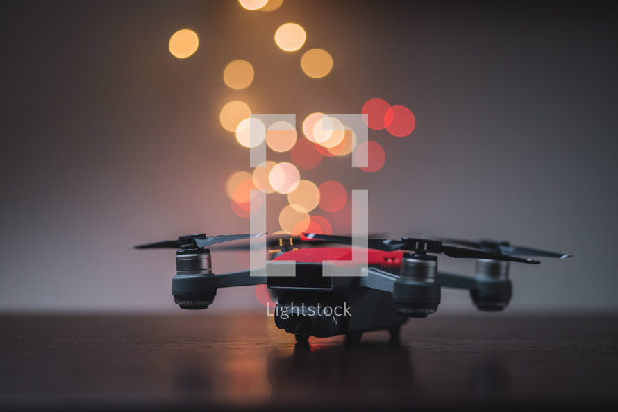 Drone aircraft and colored lights on a background