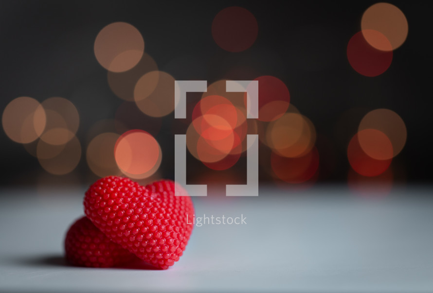 Red hearts with a ball bokeh