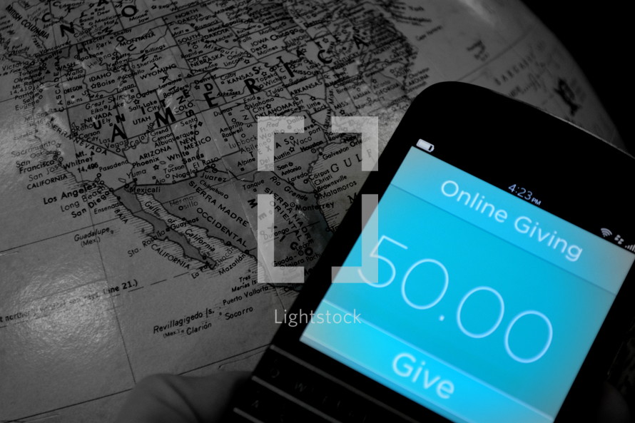online giving on a cellphone screen and globe 