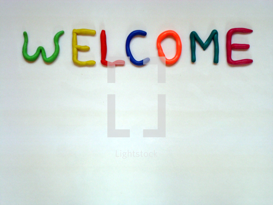 welcome in colorful dough letters, 
