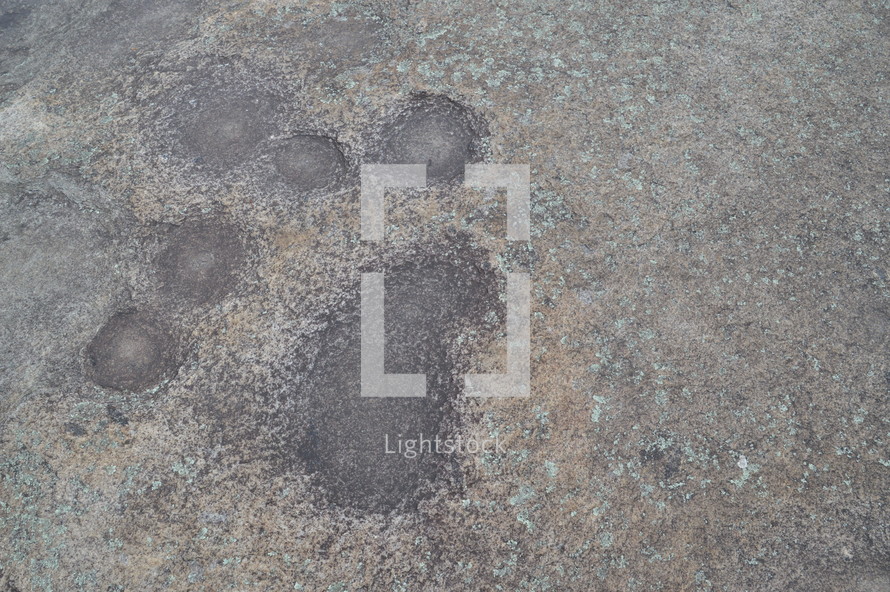spots on a rock surface 