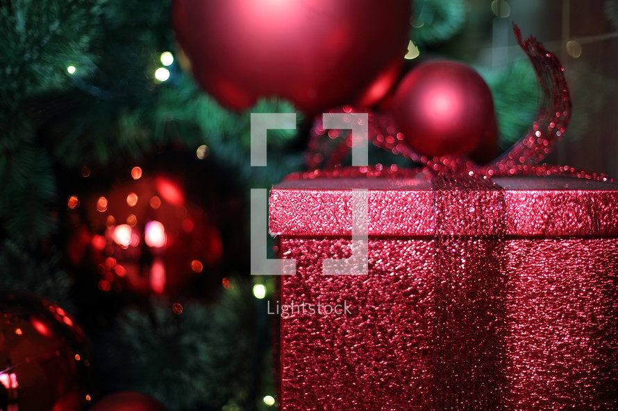 wrapped Christmas ornaments and Christmas tree 