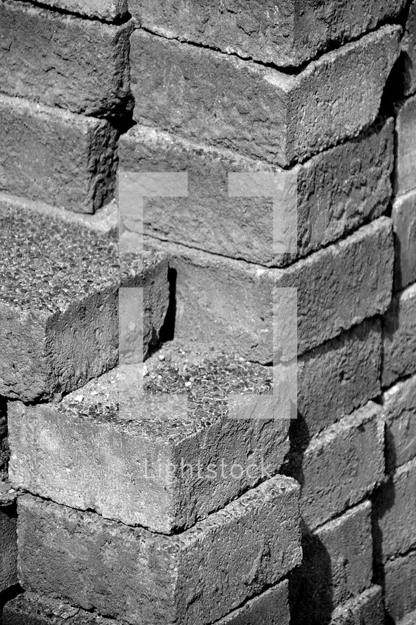 wall out of cobblestone, 
wall, cobblestone, sett, concrete, paving, stack, stone, stones, construction, build, building, new, renew, construct, block, erect, structure, base, street, road, way, roadmaking, make, making, works, work, mural, tough, severe, hard, stony, firm, solid, firmly, tight, sturdy, strong, heavy, heavily, weight, heaviness, heft, monochrome, black, white, grey, high size, vertical format, portrait format, portrait mode