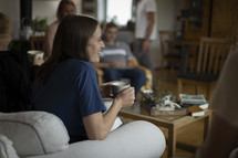 Woman with coffee at group Bible study