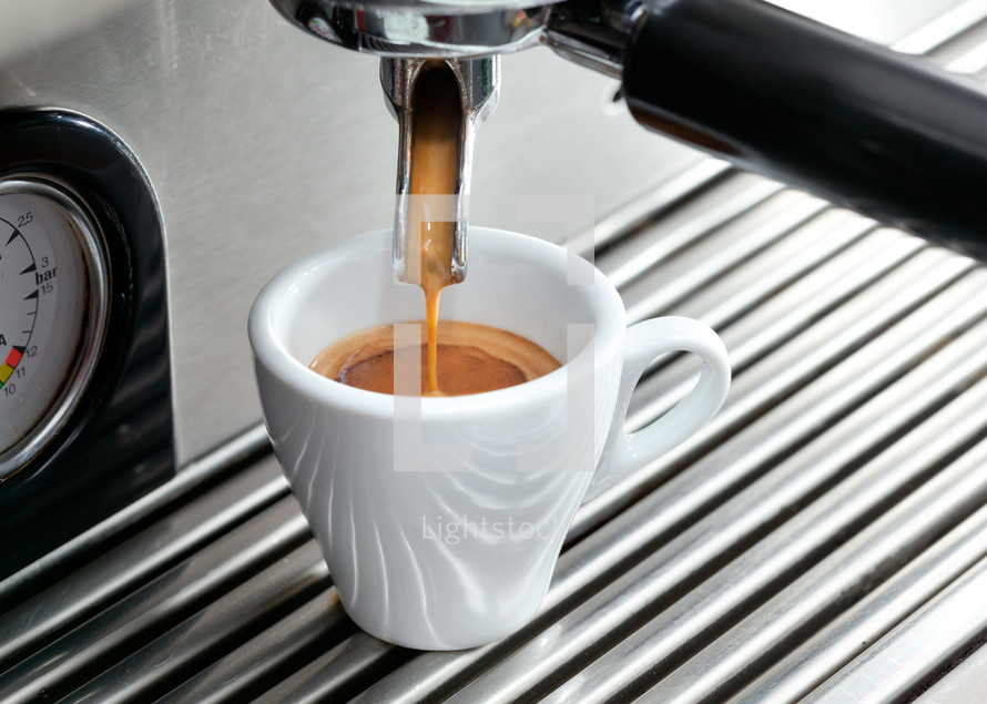 espresso machine making a cup of coffee