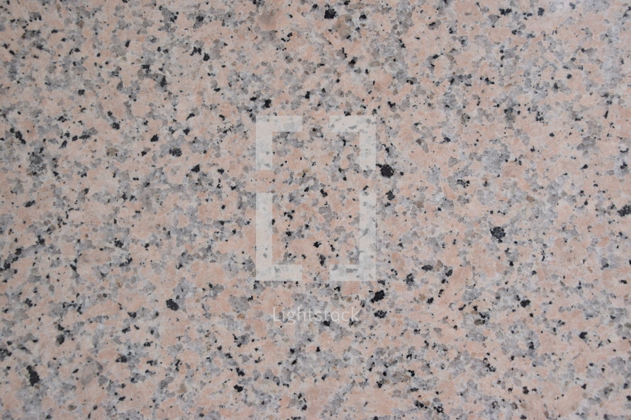 natural light pink granite stone surface as neutral background