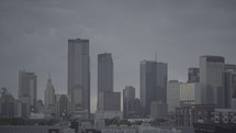 city skyline in a hazy sky