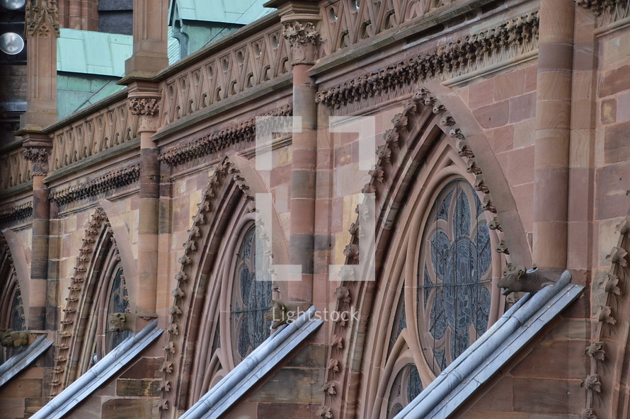 details of a cathedral.
cathedral, old, Gothic, Gothic age, Gothic style, Gothic period, gothically, Europe, sandstone, freestone, brownstone, ogive, pointed arch, tower, exterior, church, roof, steeple, spire, high, copper roof, copper, flying buttresses, tall, slim, slender, gargoyle, , waterspout, spout