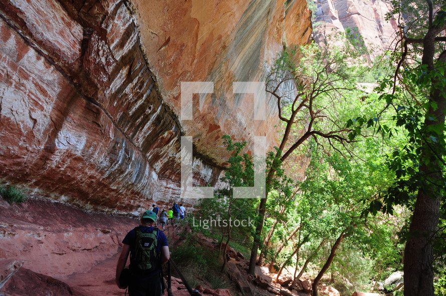 hiking through a canyon trail 