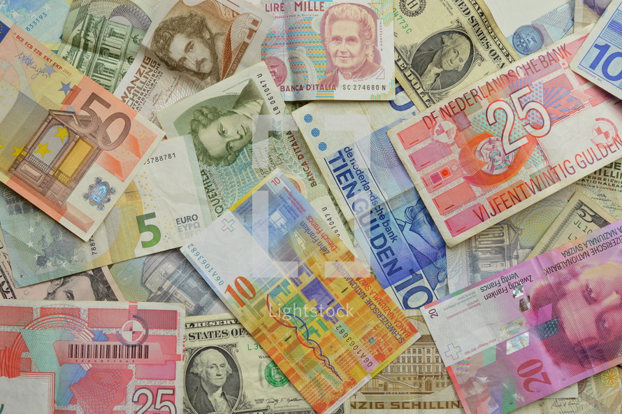 pile of currency from various countries 