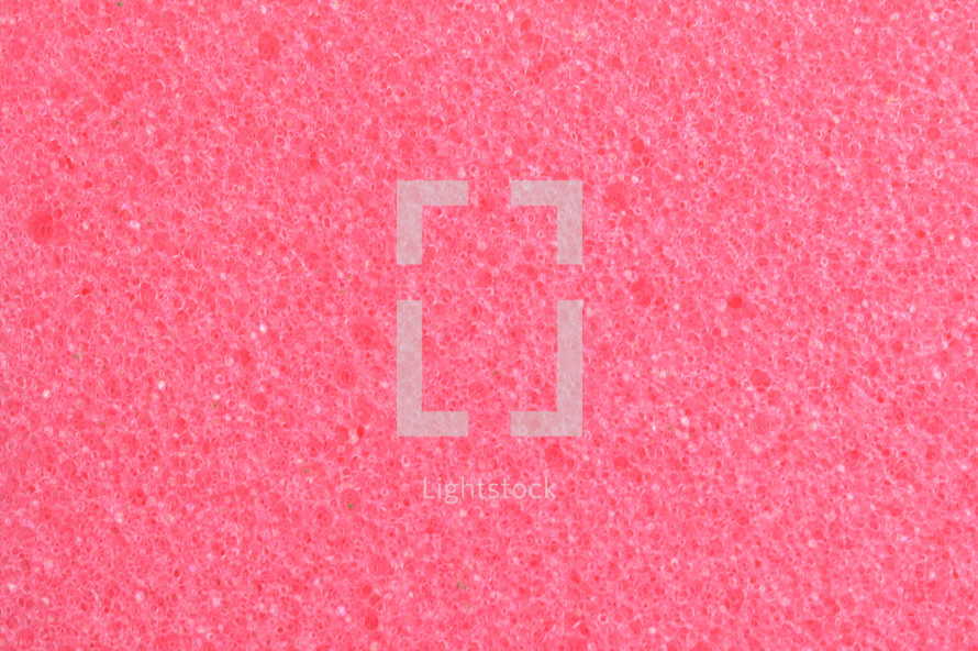 close-up of pink sponge surface as texture background