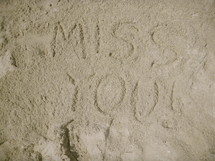 miss you written in the sand