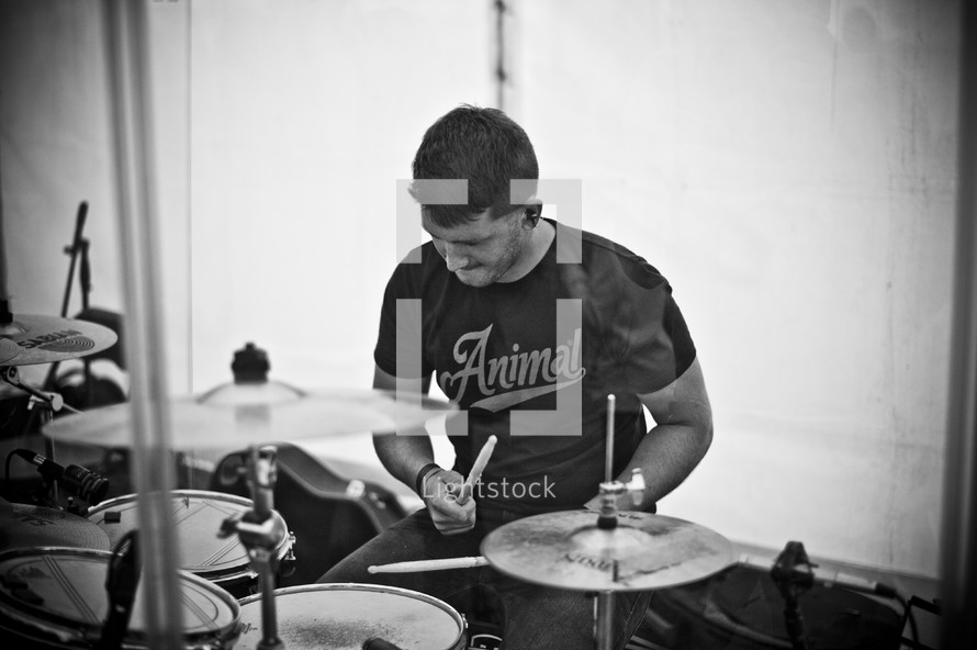 Man playing the drums.