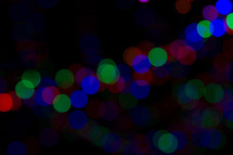 colorful bokeh Christmas lights at night 
