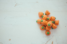 a pile of pumpkin candies 