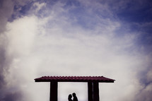 couple under a covered patio 