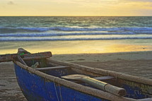 beached boat at sunrise 