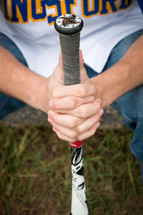 man holding a baseball bat