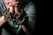 a man in chains 