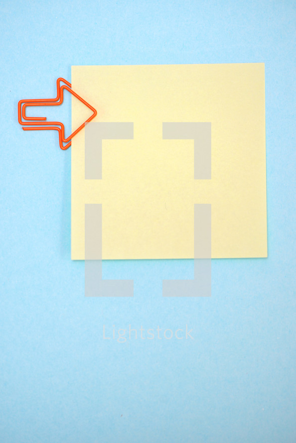 Empty post it notes with paperclips