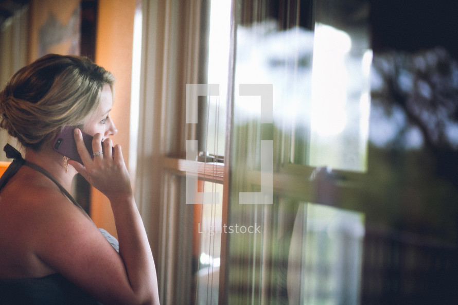 woman taking on the phone 