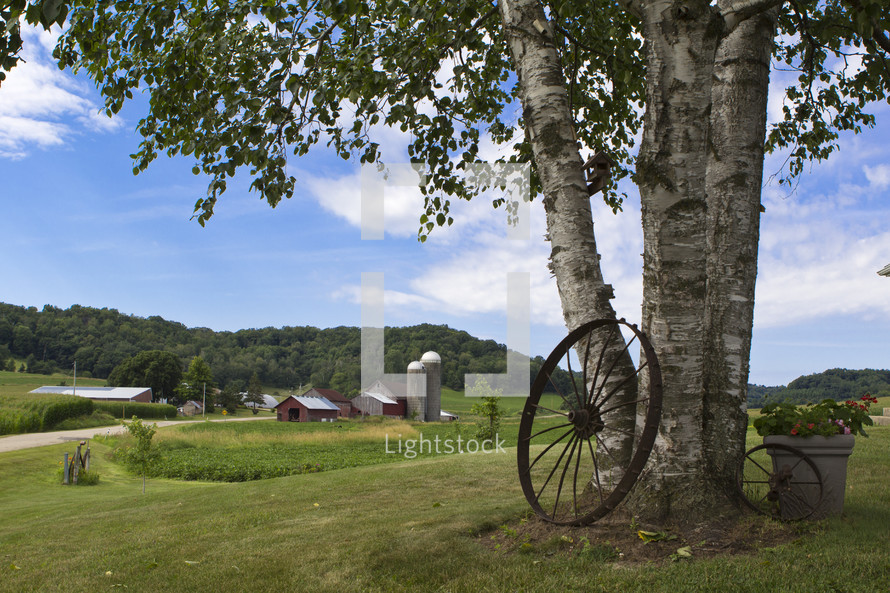 wagon wheel and a farm 