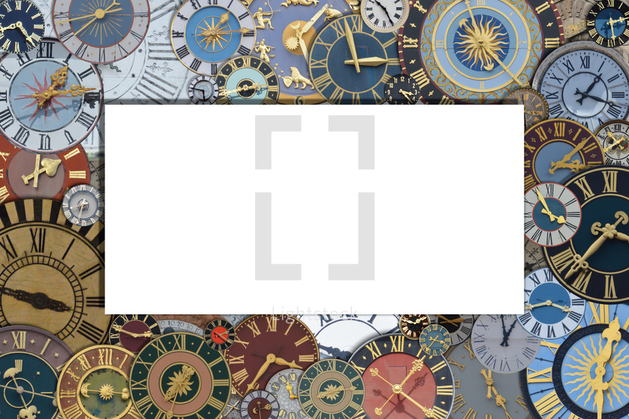 frame out of a collection of multicolored ancient church tower clocks in different sizes and forms with roman numbers isolated around a blank white card with copy space for a message or invitation