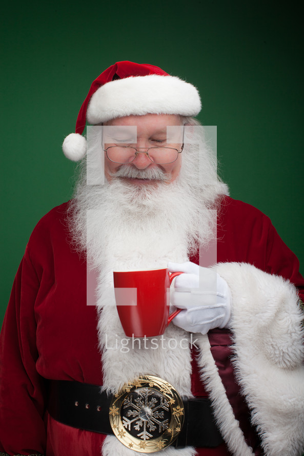 Santa holding a mug 