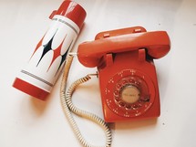 thermos and vintage rotary phone 