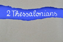 title 2 Thessalonians exposed under gray torn paper 