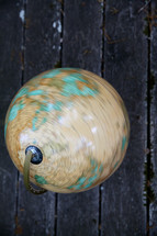 globe on old boards 