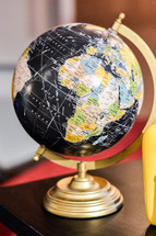 a globe on a desk 