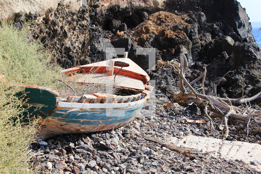 Old fishing boat on the shore.