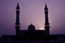 mosque towers at dusk