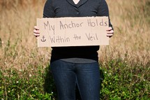 "My Anchor Holds Within the Veil" sign